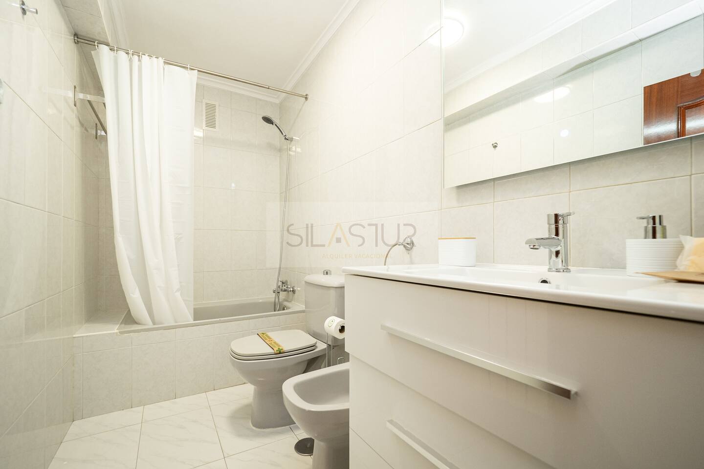 Bathroom with bathtub and shower